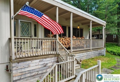 Step into this 3-bedroom, 2-bath Lake Harmony home showcasing on Split Rock Resort and Country Club in Pennsylvania - for sale on GolfHomes.com, golf home, golf lot
