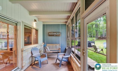 Step into this 3-bedroom, 2-bath Lake Harmony home showcasing on Split Rock Resort and Country Club in Pennsylvania - for sale on GolfHomes.com, golf home, golf lot