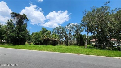 Welcome to Nature's Paradise with this extraordinary 2/3 acre on Queens Harbour Yacht and Country Club in Florida - for sale on GolfHomes.com, golf home, golf lot