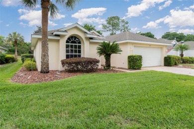 Under contract-accepting backup offers. Stunning home in the on Bay Tree Golf Course in Florida - for sale on GolfHomes.com, golf home, golf lot