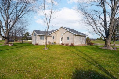 This charming 2-bedroom, 2.5 bath ranch home is a true gem! on Foxfire Golf Club in Wisconsin - for sale on GolfHomes.com, golf home, golf lot