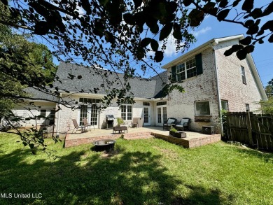 Fantastic home with lots of space located across the street fro on Diamondhead Country Club in Mississippi - for sale on GolfHomes.com, golf home, golf lot