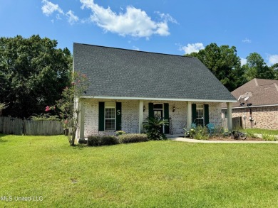 Fantastic home with lots of space located across the street fro on Diamondhead Country Club in Mississippi - for sale on GolfHomes.com, golf home, golf lot