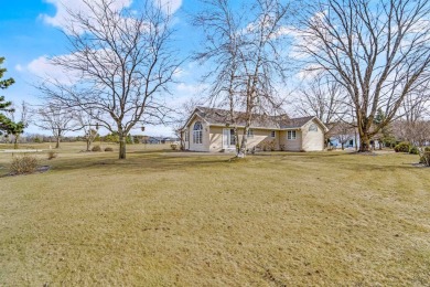 This charming 2-bedroom, 2.5 bath ranch home is a true gem! on Foxfire Golf Club in Wisconsin - for sale on GolfHomes.com, golf home, golf lot