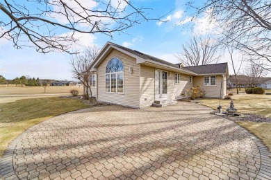 This charming 2-bedroom, 2.5 bath ranch home is a true gem! on Foxfire Golf Club in Wisconsin - for sale on GolfHomes.com, golf home, golf lot