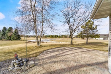 This charming 2-bedroom, 2.5 bath ranch home is a true gem! on Foxfire Golf Club in Wisconsin - for sale on GolfHomes.com, golf home, golf lot