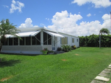 HUGE CORNER LOT PROPERTY WITH A PRIVATE DOCK & WITH A BEAUTIFUL on Cypress Creek Country Club - Boynton Beach in Florida - for sale on GolfHomes.com, golf home, golf lot