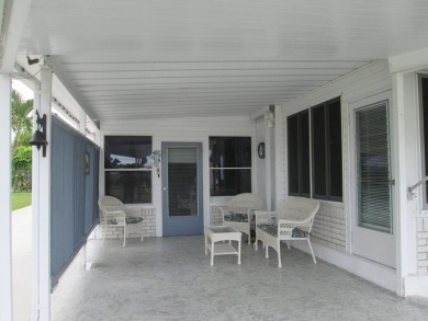 HUGE CORNER LOT PROPERTY WITH A PRIVATE DOCK & WITH A BEAUTIFUL on Cypress Creek Country Club - Boynton Beach in Florida - for sale on GolfHomes.com, golf home, golf lot