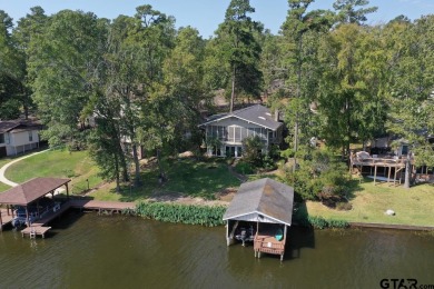 Experience the best of lakeside living with this stunning on Hide-A-Way Lake Golf Course in Texas - for sale on GolfHomes.com, golf home, golf lot