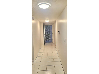 Beautiful GROUND FLOOR  2 bed 2 bath INSIDE CORNER UNIT in an on Sunrise Lakes Phase IV Golf Course in Florida - for sale on GolfHomes.com, golf home, golf lot