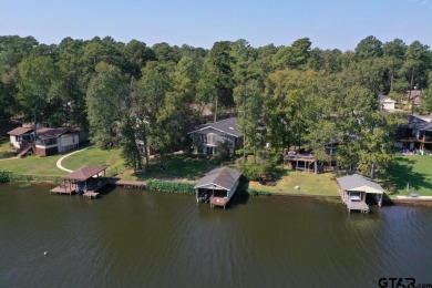 Experience the best of lakeside living with this stunning on Hide-A-Way Lake Golf Course in Texas - for sale on GolfHomes.com, golf home, golf lot