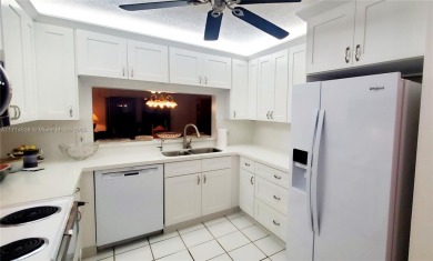 Beautiful GROUND FLOOR  2 bed 2 bath INSIDE CORNER UNIT in an on Sunrise Lakes Phase IV Golf Course in Florida - for sale on GolfHomes.com, golf home, golf lot