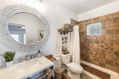 This stunning turnkey beach house is your ideal sunset retreat! on Palmilla Beach Golf Club in Texas - for sale on GolfHomes.com, golf home, golf lot