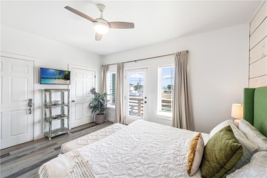 This stunning turnkey beach house is your ideal sunset retreat! on Palmilla Beach Golf Club in Texas - for sale on GolfHomes.com, golf home, golf lot