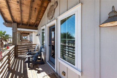 This stunning turnkey beach house is your ideal sunset retreat! on Palmilla Beach Golf Club in Texas - for sale on GolfHomes.com, golf home, golf lot