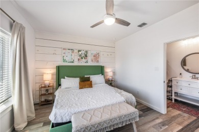 This stunning turnkey beach house is your ideal sunset retreat! on Palmilla Beach Golf Club in Texas - for sale on GolfHomes.com, golf home, golf lot