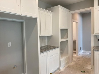 Welcome to the Haley 1.5 story plan by New Mark Homes!  Primary on Staley Farms Golf Club in Missouri - for sale on GolfHomes.com, golf home, golf lot