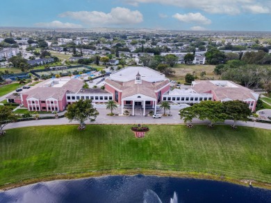 Recently renovated modern condo with new kitchen cabinets on Hillsboro Pines Golf in Florida - for sale on GolfHomes.com, golf home, golf lot