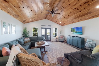This stunning turnkey beach house is your ideal sunset retreat! on Palmilla Beach Golf Club in Texas - for sale on GolfHomes.com, golf home, golf lot