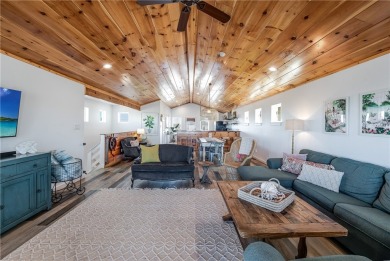 This stunning turnkey beach house is your ideal sunset retreat! on Palmilla Beach Golf Club in Texas - for sale on GolfHomes.com, golf home, golf lot