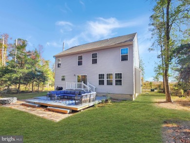 Charming 4-Bedroom Home with Stunning Bay Views in Captains Cove on Captains Cove Golf and Yacht Club in Virginia - for sale on GolfHomes.com, golf home, golf lot