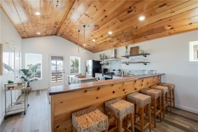 This stunning turnkey beach house is your ideal sunset retreat! on Palmilla Beach Golf Club in Texas - for sale on GolfHomes.com, golf home, golf lot
