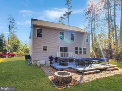 Charming 4-Bedroom Home with Stunning Bay Views in Captains Cove on Captains Cove Golf and Yacht Club in Virginia - for sale on GolfHomes.com, golf home, golf lot