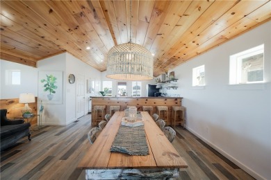 This stunning turnkey beach house is your ideal sunset retreat! on Palmilla Beach Golf Club in Texas - for sale on GolfHomes.com, golf home, golf lot