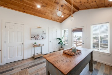 This stunning turnkey beach house is your ideal sunset retreat! on Palmilla Beach Golf Club in Texas - for sale on GolfHomes.com, golf home, golf lot