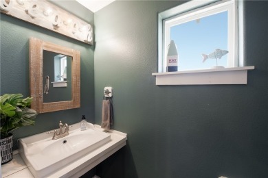 This stunning turnkey beach house is your ideal sunset retreat! on Palmilla Beach Golf Club in Texas - for sale on GolfHomes.com, golf home, golf lot