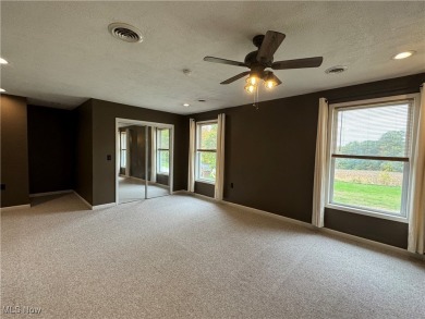 Welcome to this stunning open-concept home featuring 3 spacious on Pleasant Hill Golf Course in Ohio - for sale on GolfHomes.com, golf home, golf lot