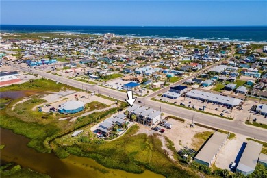 This stunning turnkey beach house is your ideal sunset retreat! on Palmilla Beach Golf Club in Texas - for sale on GolfHomes.com, golf home, golf lot