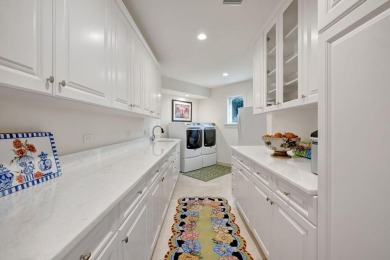Experience the luxury and elegance of this Sailfish Point estate on Sailfish Point Golf Club, Inc. in Florida - for sale on GolfHomes.com, golf home, golf lot