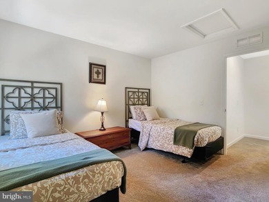 Charming 4-Bedroom Home with Stunning Bay Views in Captains Cove on Captains Cove Golf and Yacht Club in Virginia - for sale on GolfHomes.com, golf home, golf lot