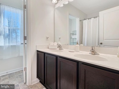 Charming 4-Bedroom Home with Stunning Bay Views in Captains Cove on Captains Cove Golf and Yacht Club in Virginia - for sale on GolfHomes.com, golf home, golf lot