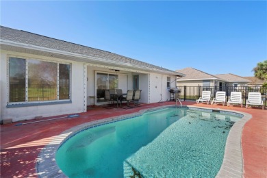 FURNISHED POOL HOME W/CANAL VIEW IN ROTONDA WEST - This move-in on Pinemoor West Golf Club in Florida - for sale on GolfHomes.com, golf home, golf lot