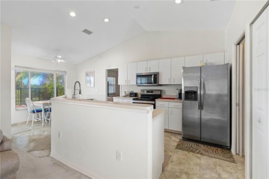 FURNISHED POOL HOME W/CANAL VIEW IN ROTONDA WEST - This move-in on Pinemoor West Golf Club in Florida - for sale on GolfHomes.com, golf home, golf lot