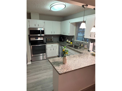 Upgraded and remodeled, popular Montgomery Model home, on a on On Top of the World Golf Course in Florida - for sale on GolfHomes.com, golf home, golf lot