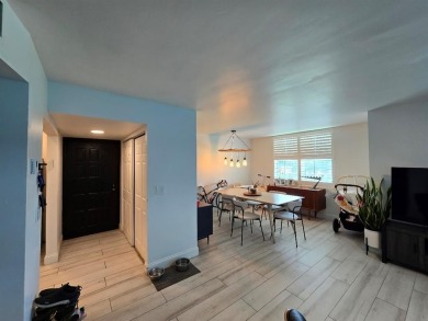 Welcome to this gut-renovated 2-bedroom, 2-bathroom penthouse on The Club at Emerald Hills in Florida - for sale on GolfHomes.com, golf home, golf lot