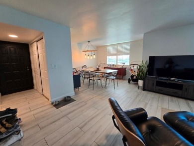 Welcome to this gut-renovated 2-bedroom, 2-bathroom penthouse on The Club at Emerald Hills in Florida - for sale on GolfHomes.com, golf home, golf lot