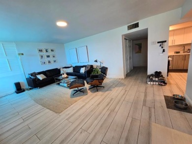Welcome to this gut-renovated 2-bedroom, 2-bathroom penthouse on The Club at Emerald Hills in Florida - for sale on GolfHomes.com, golf home, golf lot