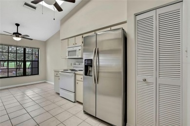 This charming villa, located on the first hole of the Grand on Timber Pines Golf Course in Florida - for sale on GolfHomes.com, golf home, golf lot