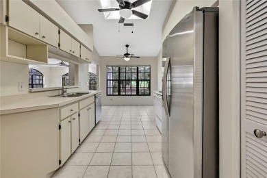 This charming villa, located on the first hole of the Grand on Timber Pines Golf Course in Florida - for sale on GolfHomes.com, golf home, golf lot