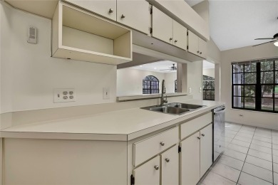 This charming villa, located on the first hole of the Grand on Timber Pines Golf Course in Florida - for sale on GolfHomes.com, golf home, golf lot