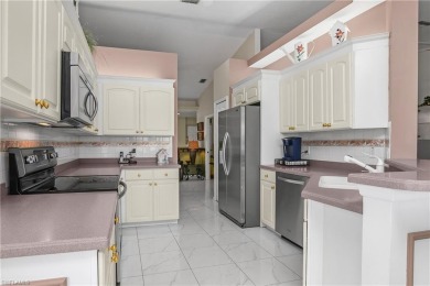 Welcome to this beautifully maintained second-floor residence in on  in Florida - for sale on GolfHomes.com, golf home, golf lot