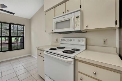This charming villa, located on the first hole of the Grand on Timber Pines Golf Course in Florida - for sale on GolfHomes.com, golf home, golf lot
