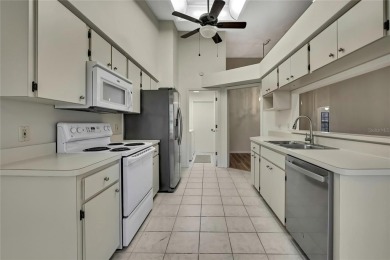 This charming villa, located on the first hole of the Grand on Timber Pines Golf Course in Florida - for sale on GolfHomes.com, golf home, golf lot