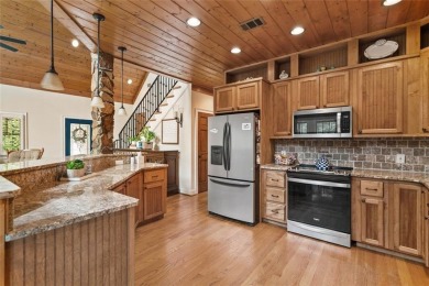 Come home to this mountain retreat located in the sought-after on The Highlands Course at Lake Arrowhead in Georgia - for sale on GolfHomes.com, golf home, golf lot