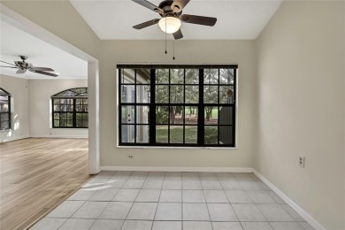 This charming villa, located on the first hole of the Grand on Timber Pines Golf Course in Florida - for sale on GolfHomes.com, golf home, golf lot