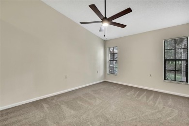 This charming villa, located on the first hole of the Grand on Timber Pines Golf Course in Florida - for sale on GolfHomes.com, golf home, golf lot